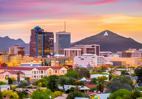 Tucson, Arizona, USA downtown skyline with Sentinel Peak at dusk.